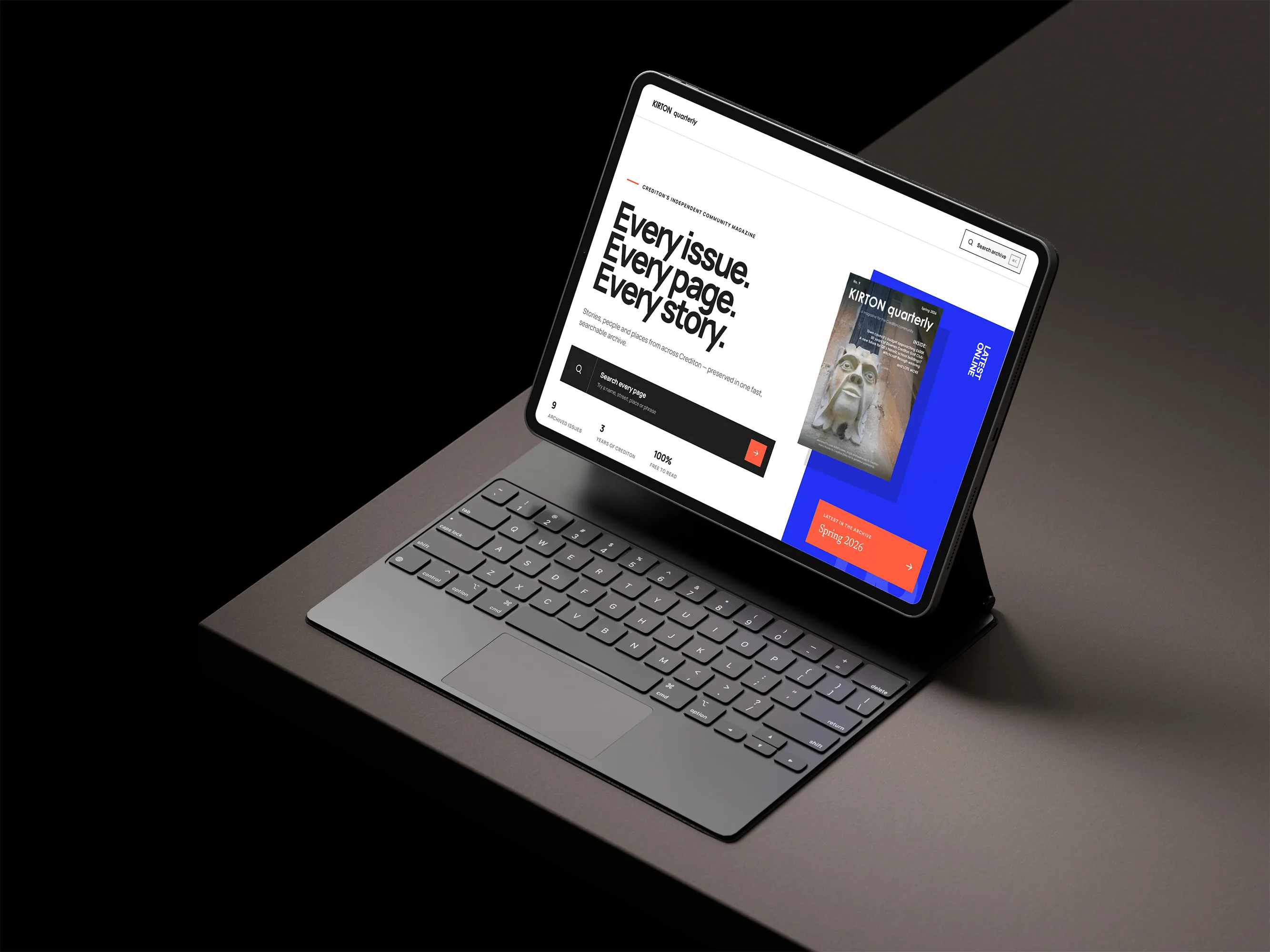 KIRTON quarterly digital archive displayed on a tablet with keyboard in a dark studio setting
